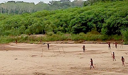 X/@Survival
 : The rare photos were released by Survival International on Tuesday, showing numerous tribe members relaxing by a riverbank.

